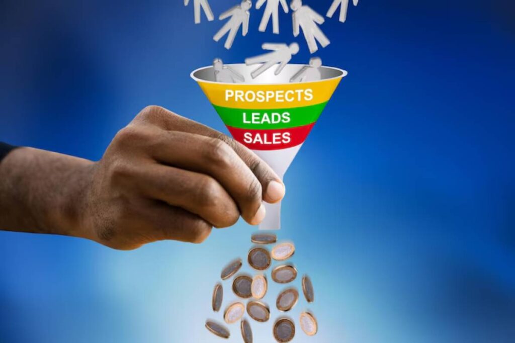 A hand pouring coins into a funnel labeled 'Prospects,' 'Leads,' and 'Sales,' symbolizing the sales process.